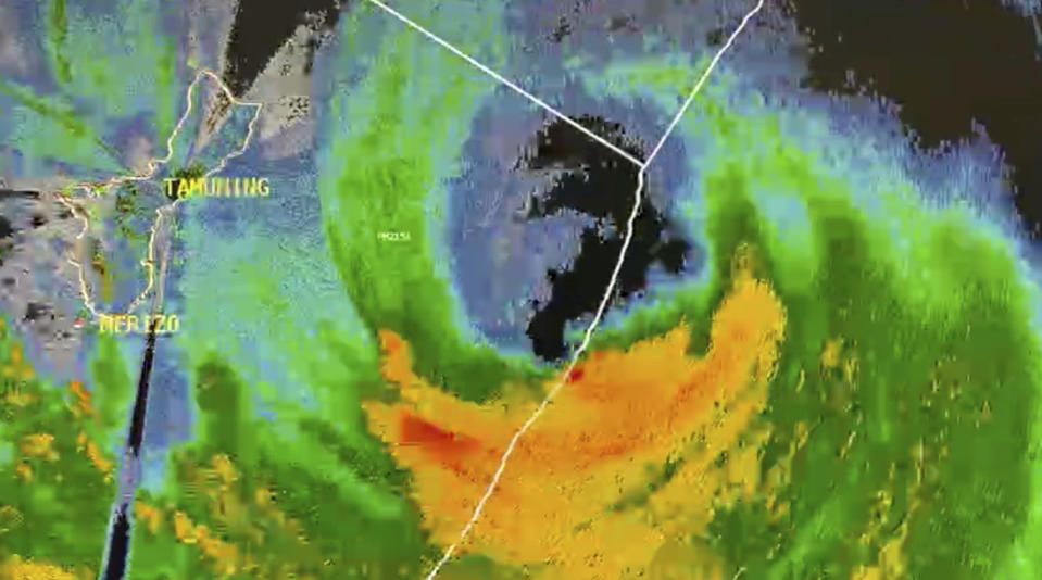 In this image taken from live a satellite video from the U.S. National Weather Service Guam, Typhoon Mawar is seen on radar at a press conference by the National Weather Service in the U.S. Pacific territory of Guam as the storm approached landfall, on Wednesday, May 24, 2023. (U.S. National Weather Service Guam via AP)