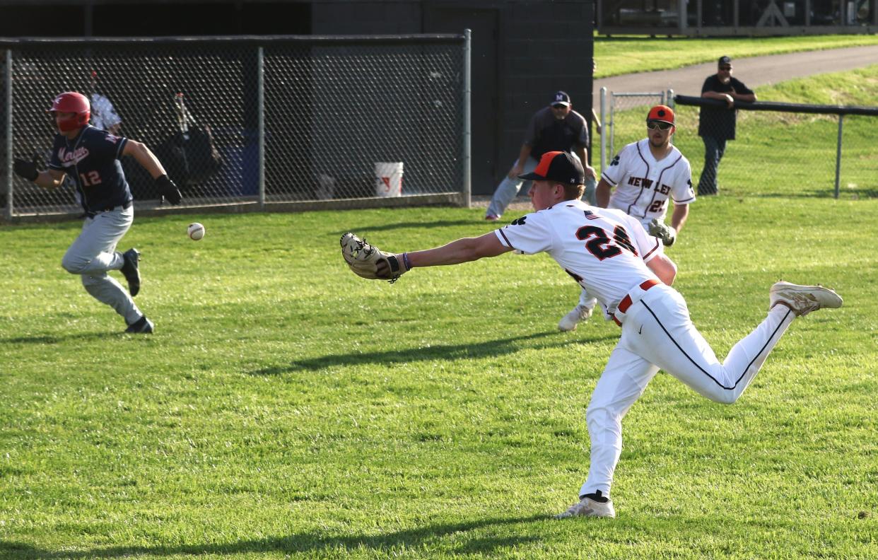 New Lexington pitcher Garrett Blosser flips the ball home to retire Morgan's Logan Niceswanger in Tuesday's MVL Small School Division game.