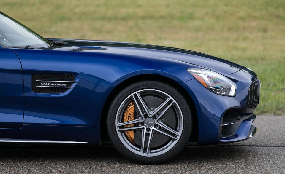 <p>Think of the GT C that has been added to <u><a rel="nofollow noopener" href="https://patty-caranddriver.hearstapps.com/mercedes-amg/gt-gt-s" target="_blank" data-ylk="slk:the Mercedes-AMG GT lineup;elm:context_link;itc:0;sec:content-canvas" class="link ">the Mercedes-AMG GT lineup</a></u> as the equivalent of the Carrera GTS in the Porsche 911 roster. Both cars are the third step up on the power and expense ladder. Both come standard with distinctive interior and exterior design details. Both have fatter rear haunches to accommodate wider wheels and an increase in track compared with their lesser brethren. And both are topped by a track-oriented model further up the price and power scale-the GT R in the AMG's case and <a rel="nofollow noopener" href="https://www.caranddriver.com/porsche/911-gt3-gt3-rs" target="_blank" data-ylk="slk:the GT3 for the Porsche;elm:context_link;itc:0;sec:content-canvas" class="link ">the GT3 for the Porsche</a>.</p>