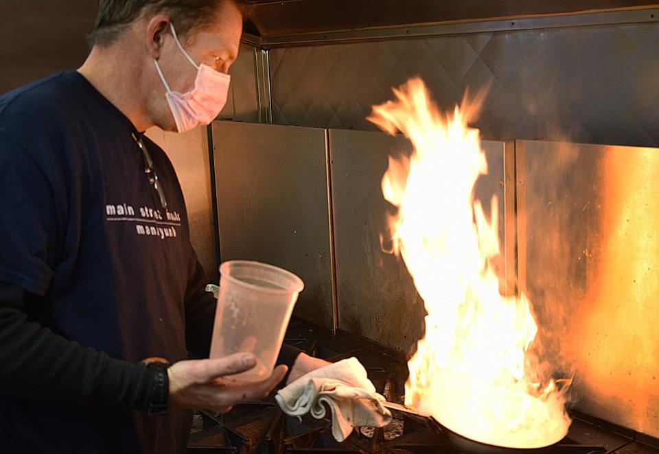 Chef Brendan O'Neil cooks up a dish at The Italian Kitchen at The Don Carlos Club in Fall River.