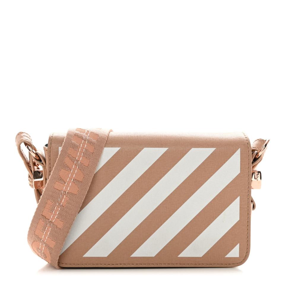 <p><a href="https://go.redirectingat.com?id=74968X1596630&url=https%3A%2F%2Fwww.fashionphile.com%2Fp%2Foff-white-saffiano-striped-mini-diag-bag-nude-white-1267438&sref=https%3A%2F%2F" rel="nofollow noopener" target="_blank" data-ylk="slk:Shop Now;elm:context_link;itc:0;sec:content-canvas" class="link ">Shop Now</a></p><p>Saffiano Striped Mini Diag Bag Nude White</p><p>fashionphile.com</p><p>$520.00</p>