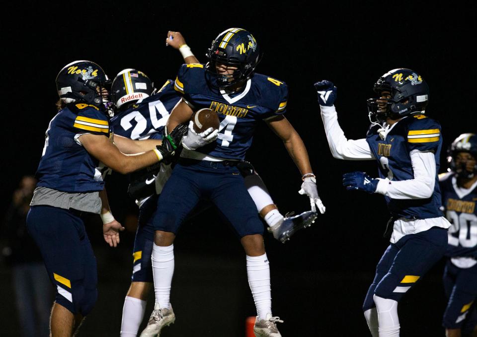 Toms River North’s Jeremiah Pruitt celebrates after making a touchdown reception at the end of the first half. East Brunswick at Toms River North NJSIAA South Group 5 quarterfinal-round football game.                                                                                     Toms River, NJFriday, November 5, 2021  