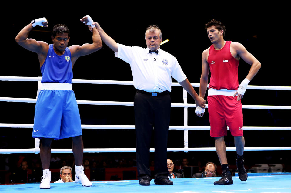 <b>Sumit Sangwan boxing result:</b> India lodged an official complaint with the organisers of the London Olympics after boxer Sumit Sangwan's controversial loss to Brazilian Yamaguchi Falcao Florentino in the round of 32 in the 81 kg category. The appeal was subesequently rejected.<br><br> <a href="http://in.news.yahoo.com/sangwan-loses-controversial-bout-india-lodges-complaint-154828301.html " data-ylk="slk:Sangwan loses controversial bout, India lodges complaint;elm:context_link;itc:0;sec:content-canvas;outcm:mb_qualified_link;_E:mb_qualified_link;ct:story;" class="link  yahoo-link">Sangwan loses controversial bout, India lodges complaint</a>