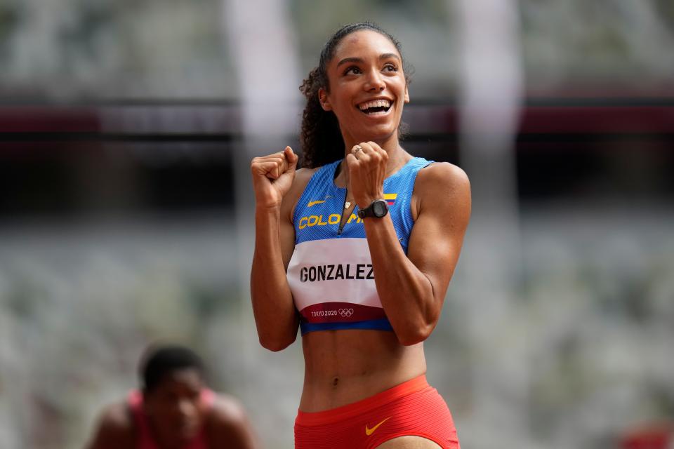 Melissa Gonzalez, of Colombia, reacts after competing in a heat in the women's 400-meter hurdles at the 2020 Summer Olympics, Saturday, July 31, 2021, in Tokyo.