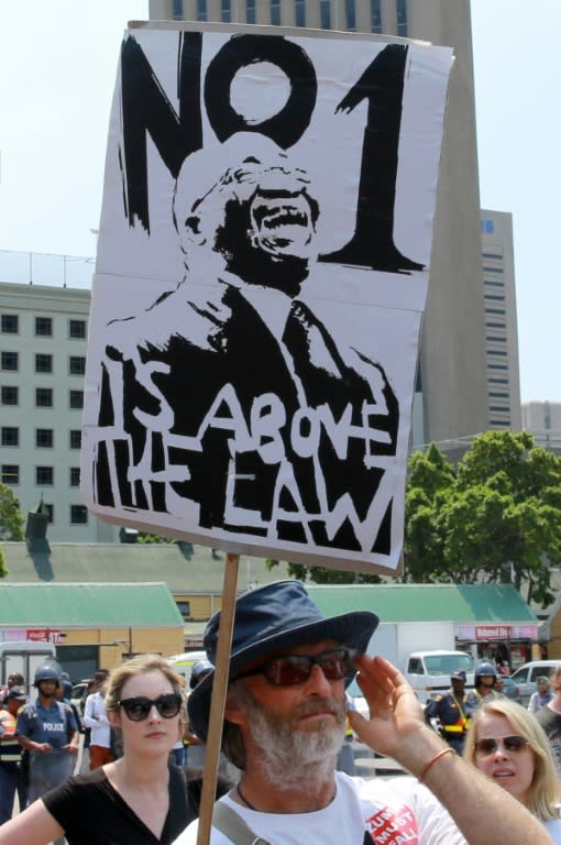 Campaigners demonstrate against South African President Jacob Zuma on February 11, 2016 in Cape Town