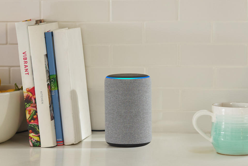 An Amazon Echo smart speaker on a countertop.
