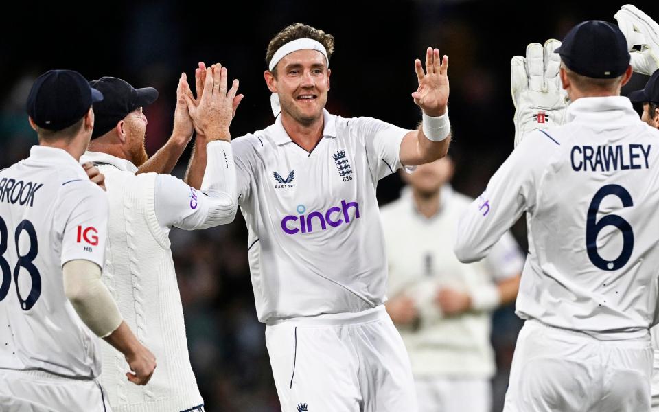 Stuart Broad, center, celebrates with teammates after taking the wicket of New Zealand's Kane Williamson on the third day of their cricket test match in Tauranga, New Zealand, Saturday, Feb. 18, 2023 - AP/Andrew Cornaga