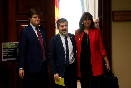 Jailed Catalan politician Jordi Sanchez leaves after getting his parliamentary credentials at Spanish Parliament, in Madrid, Spain, May 20, 2019. REUTERS/Susana Vera