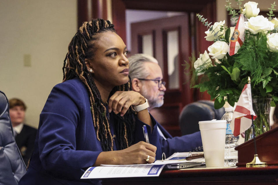 Florida House Minority Leader Fentrice Driskell, D-Tampa, listens to Gov. Ron DeSantis give his State of the State address during a joint session of the Senate and House of Representatives in Tallahassee, Fla., Tuesday, Jan. 9, 2024. (AP Photo/Gary McCullough)