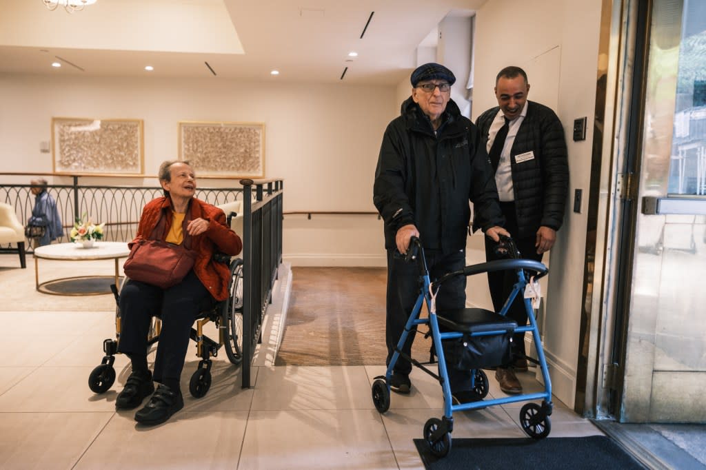 On the move: Esther Goodman, 78, and Dr. Jerry Beeber, 84, are seen leaving the Watermark. Stephen Yang