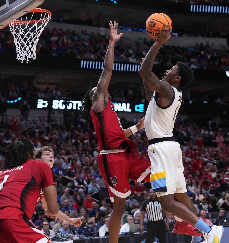 Kam Jones led Marquette with 20 points but he struggled with his three-point shooting during the Golden Eagles' 67-58 loss to NC State in the Sweet 16.