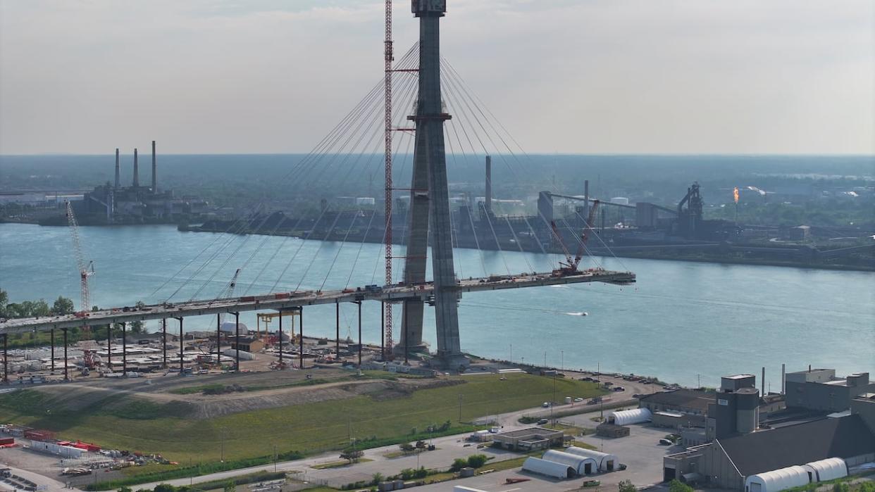 Crews work on the Canadian side of the Gordie Howe International Bridge in July. (Patrick Morrell/CBC - image credit)