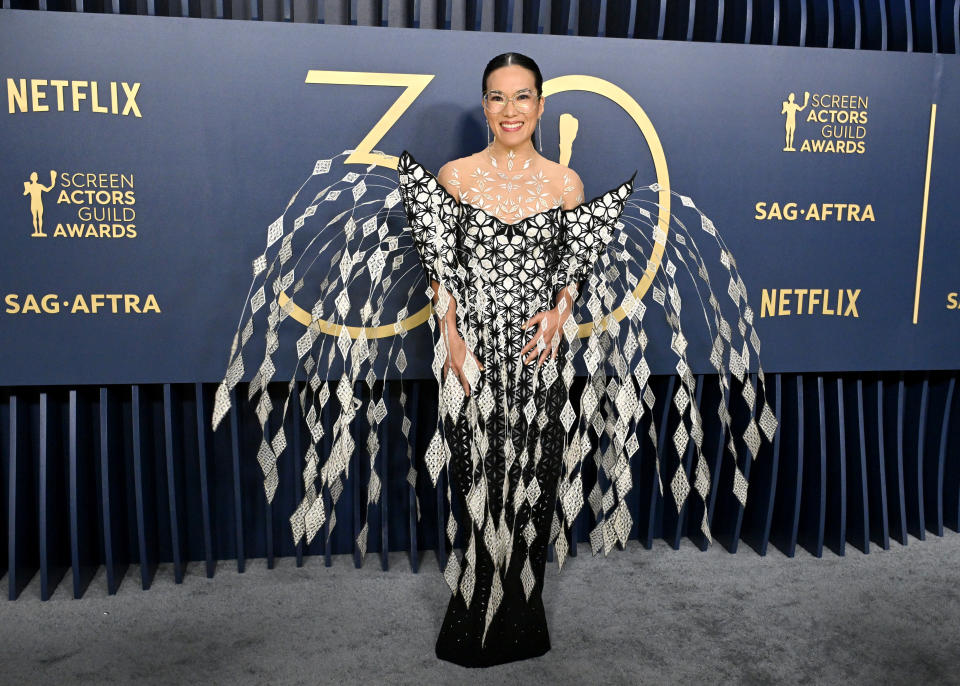 A closeup of Ali Wong on the red carpet