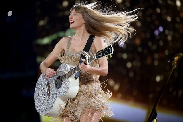 <p>Scott Eisen/TAS23/Getty</p> Taylor Swift performing on the Eras Tour at Gillette Stadium in Foxborough, Massachusetts in May 2023