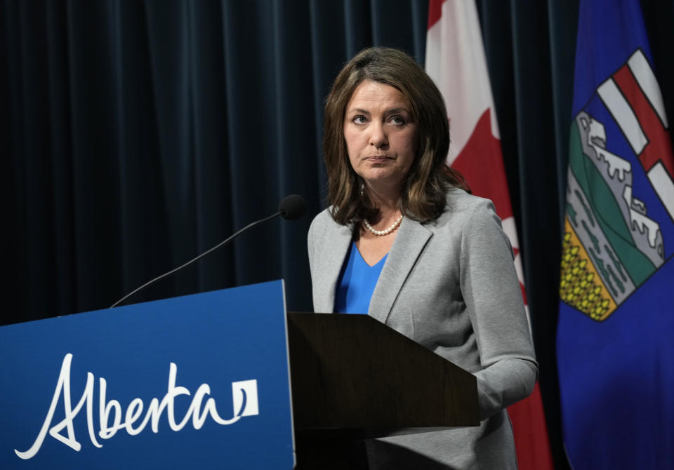 Alberta Premier Danielle Smith listens to a reporter’s question at a news conference in Calgary on Thursday, February 1, 2024. THE CANADIAN PRESS/Todd Korol