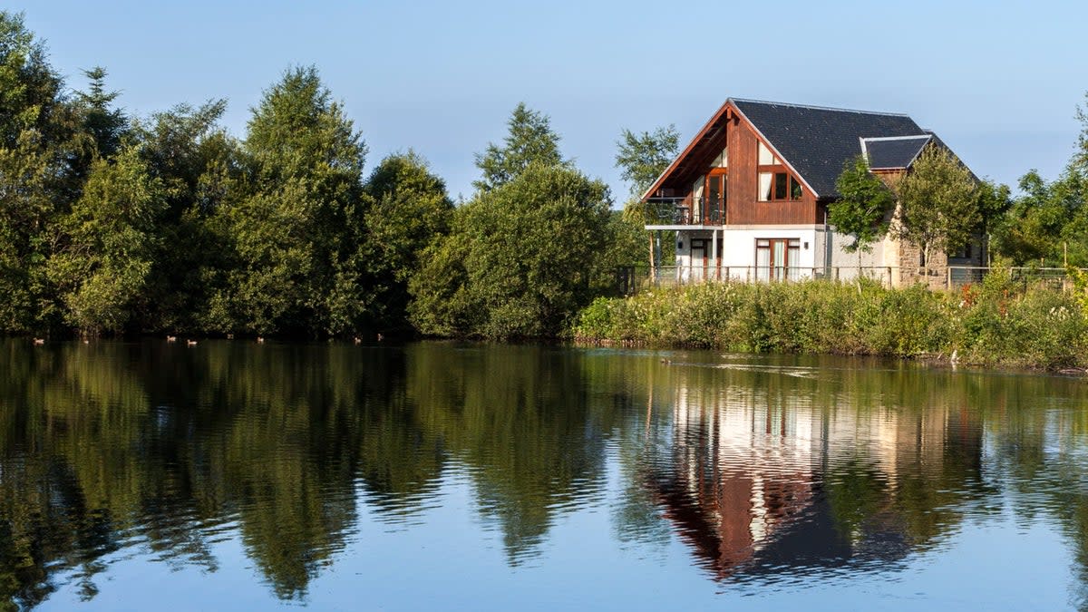 Four bedroom detached lodges overlook a peaceful pond (Cameron Lodges)