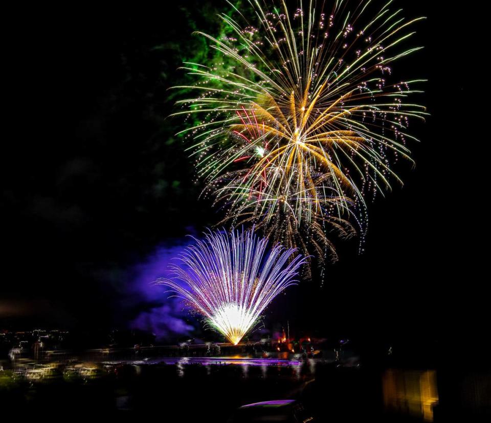 Fireworks explode over the Cayucos Pier on July 4, 2021.