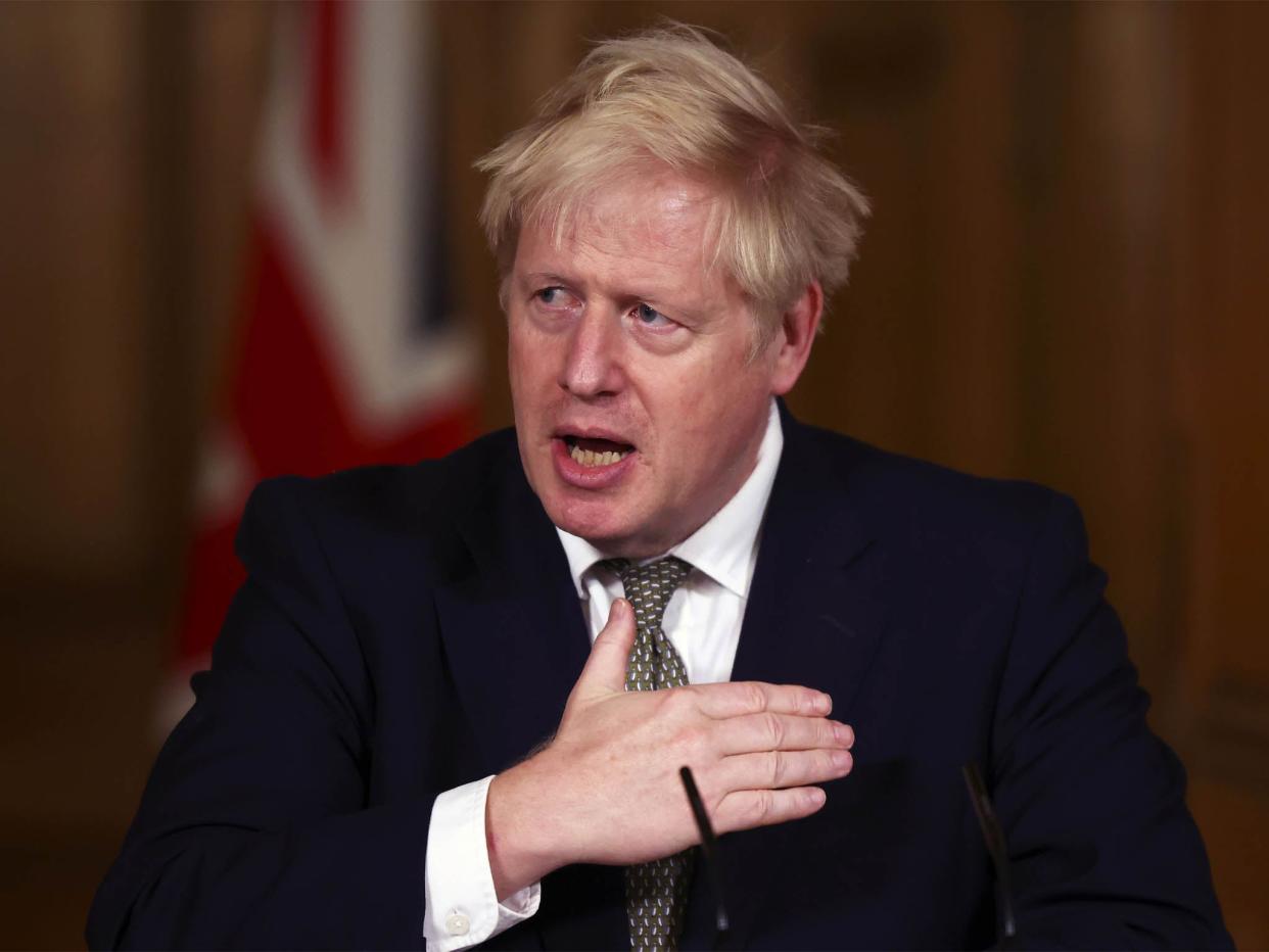 Mr Johnson will hold a press conference with chief scientific advisor Sir Patrick Vallance and chief medical officer Professor Chris Whitty at 5pm today (AFP via Getty Images)