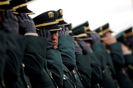 FILE PHOTO: Colombian soldiers attend the inauguration ceremony for the new defense minister in Bogota, Colombia August 14, 2018. REUTERS/Luisa Gonzalez/File Photo