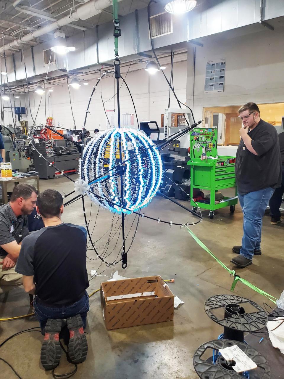 The TCAT Harriman group involved in the atom "ball" drop design and construction include Chris Ayers, TCAT Harriman vice president, Andrew Aydelott, machine tool tech (engineering) instructor, and Troy Hensley, welding tech instructor.