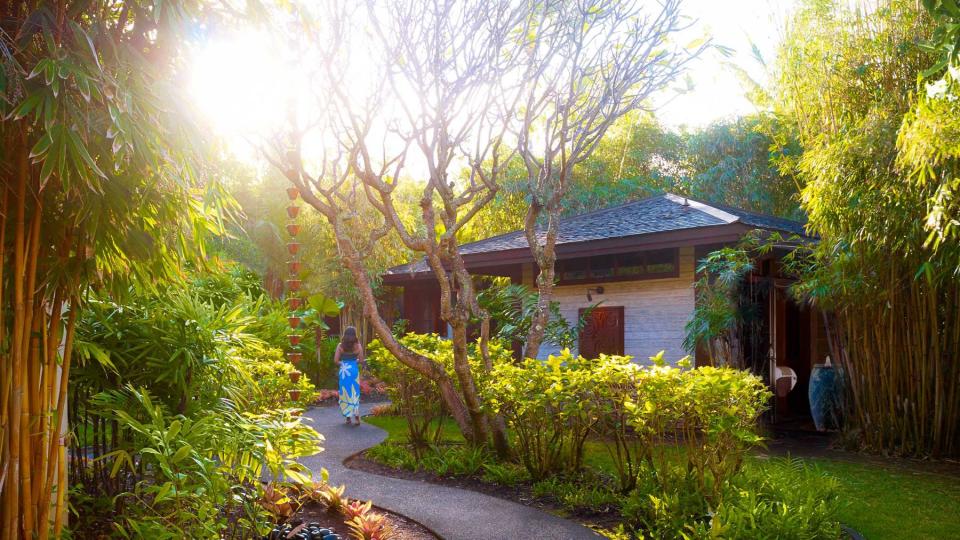 A guest walks to the spa of the Montage Kapalua Bay, voted one of the best resorts and hotels in Hawaii