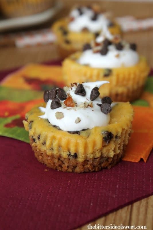 <p>The Bitter Side of Sweet</p><p>Single serving cheesecakes, with pecan graham cracker crust full of pumpkin and chocolate chips! </p><p><strong>Get the recipe: <a href="https://www.thebittersideofsweet.com/chocolate-chip-pumpkin-cheesecake-bites/" rel="nofollow noopener" target="_blank" data-ylk="slk:Chocolate Chip Pumpkin Cheesecake Bites;elm:context_link;itc:0;sec:content-canvas" class="link ">Chocolate Chip Pumpkin Cheesecake Bites</a></strong></p>