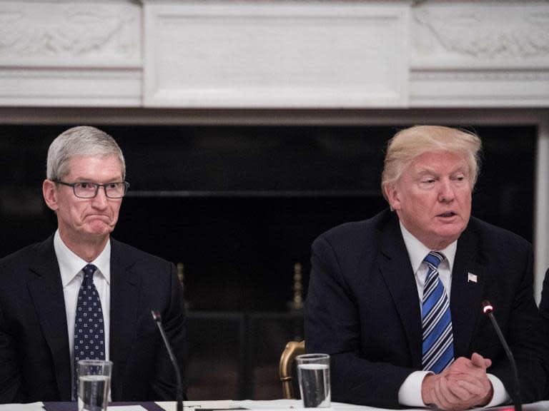 World's biggest tech CEOs pictured with Donald Trump looking awkward and unimpressed