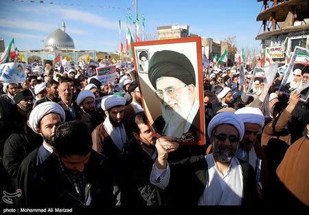 People take part in pro-government rallies, Iran, January 3, 2018. Tasnim News Agency/Handout via REUTERS