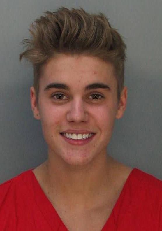 Why is he so happy in this mugshot? Was he still high...? Source: LAPD