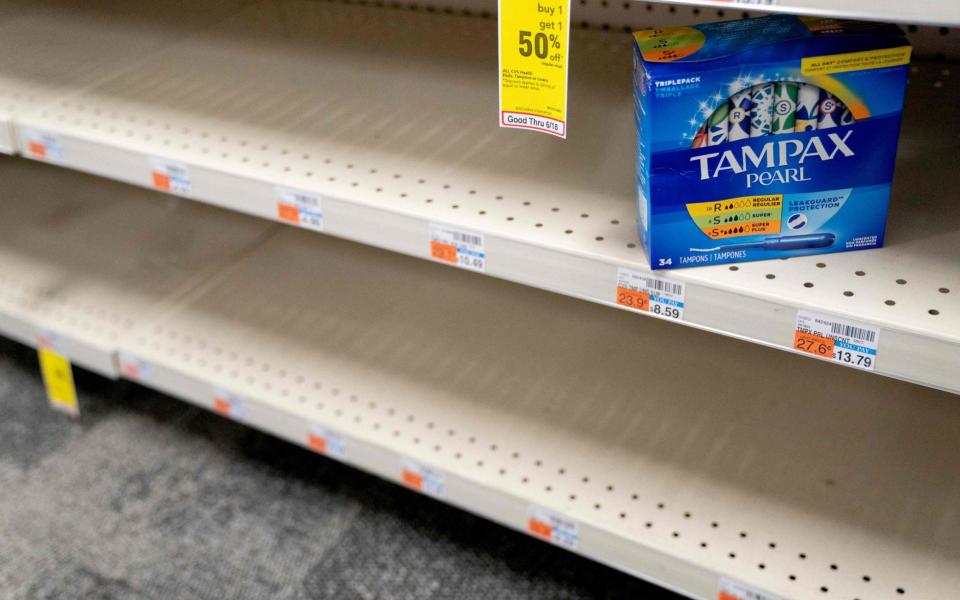 Women in the US have described facing empty shelves - AFP