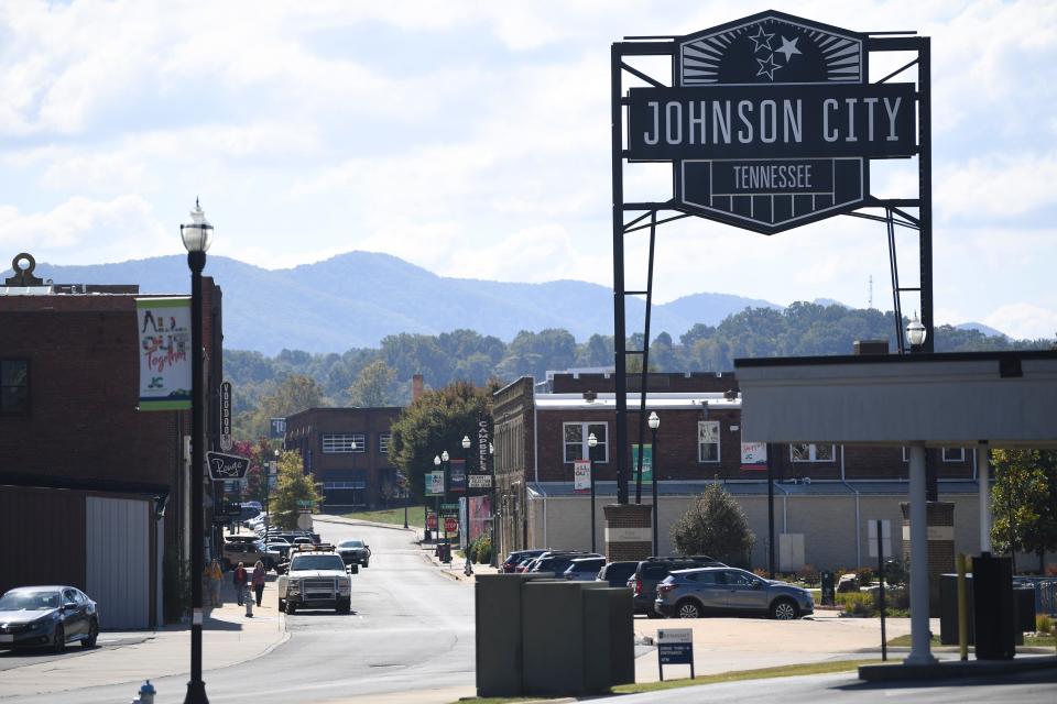 The mountains are seen in the distance from downtown Johnson City, Thursday, Oct. 12, 2023.