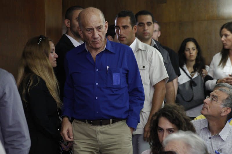 Former Israeli Prime Minister Ehud Olmert arrives at the Tel Aviv District Court on May 13, 2014. Olmert was sentenced to six years' imprisonment for taking bribes. File Photo by Finbarr O'Reilly/UPI