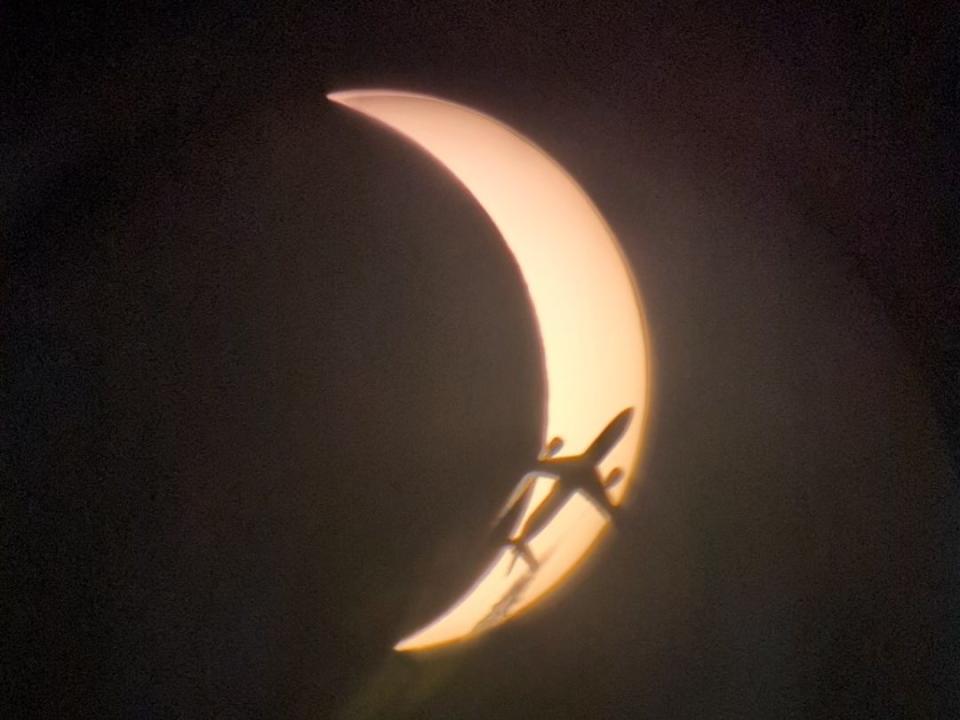 Angela White was in Chesapeake taking photos of the eclipse on her telescope when she captured this incredible image of a plane passing in front of the disappearing sun. She was kind enough to share the photo with WAVY.