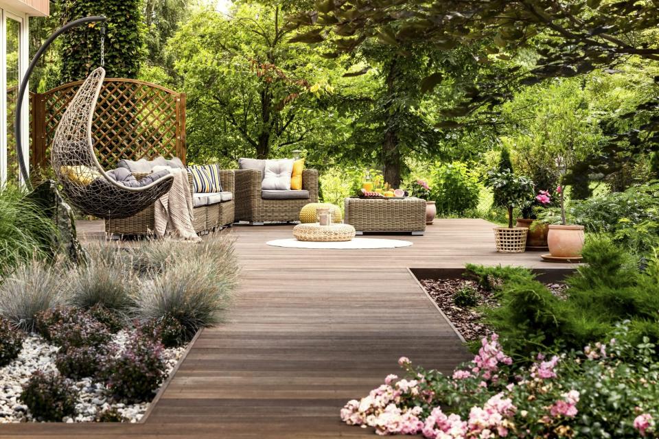wooden plank deck with modern outdoor furniture