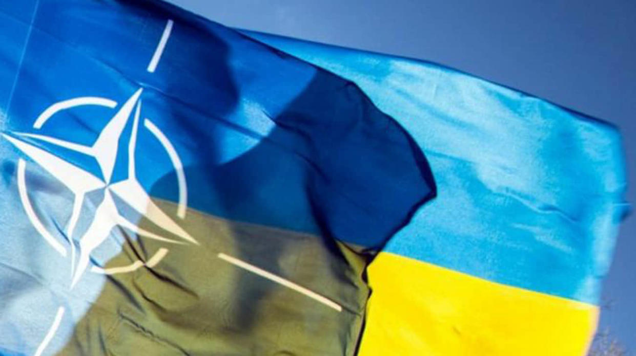 NATO and Ukraine flags.