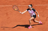 Tunisia's Ons Jabeur plays a return to United States's Coco Gauff during their fourth round match on day 9, of the French Open tennis tournament at Roland Garros in Paris, France, Monday, June 7, 2021. (AP Photo/Michel Euler)