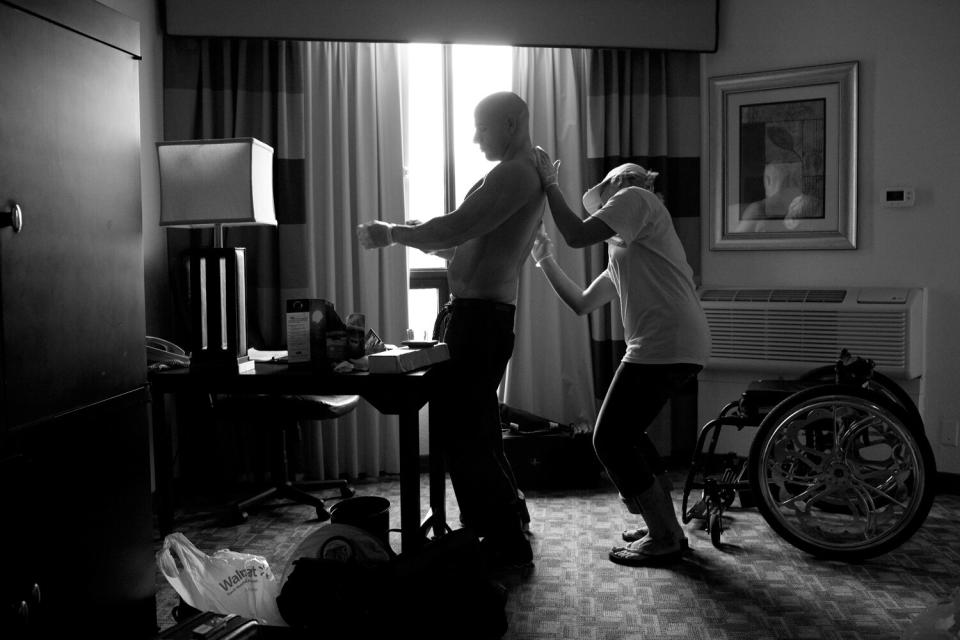 Nick Scott preps his skin before The Texas Shredder. Most bodybuilding competitions do not have a wheelchair division, including this one, but Scott was invited to guest pose.