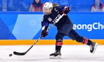 Feb 18, 2018; Gangneung, South Korea; United States forward Meghan Duggan (10) shoots the puck against Finland in the women's ice hockey semifinals during the Pyeongchang 2018 Olympic Winter Games at Gangneung Hockey Centre. Andrew Nelles-USA TODAY Sports