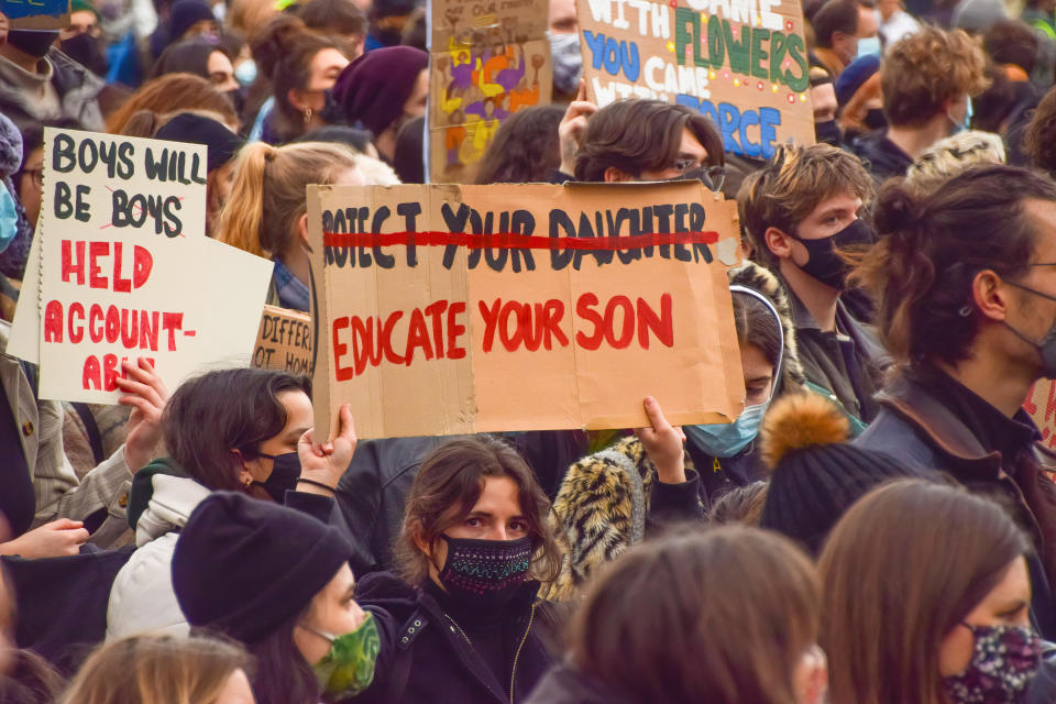 <p>A protester holds a placard that says Educate Your Son in Parliament Square during the demonstration. Crowds of people gathered in London to protest against the heavy-handed response by the police at the Sarah Everard vigil, as well as the government's new Police, Crime, Sentencing and Courts Bill, which would give the police new powers to deal with protests. (Photo by Vuk Valcic / SOPA Images/Sipa USA)</p>
