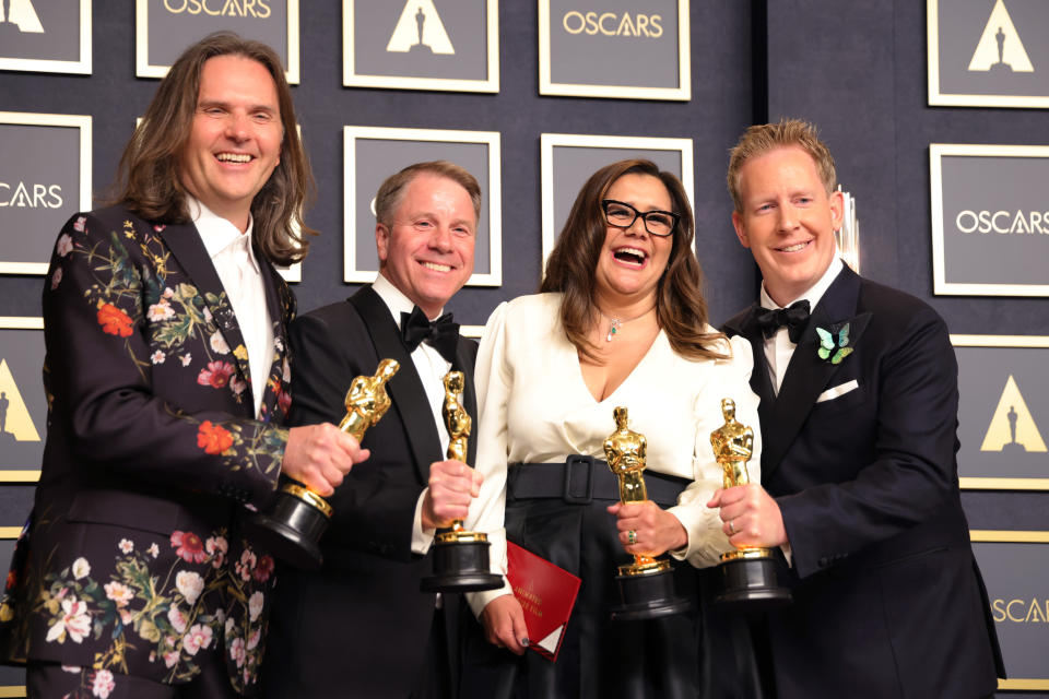 HOLLYWOOD, CALIFORNIA - MARCH 27: (L-R) Byron Howard, Clark Spencer, Yvett Merino and Jared Bush, winners of Animated Feature Film award for 