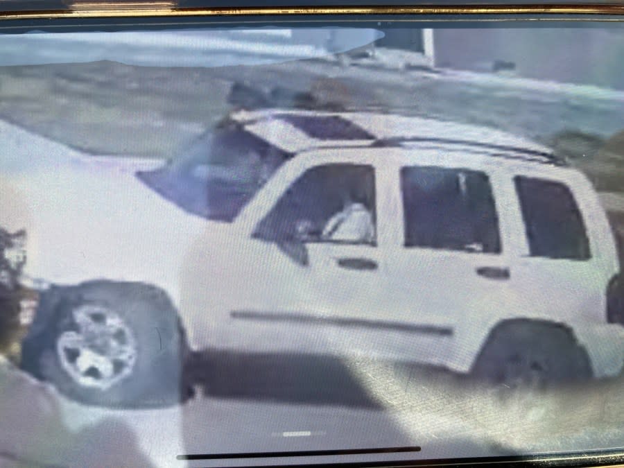 Police said the vehicle they are searching for is a white Jeep Liberty from the 2000s that is said to be involved in a possible abduction on March 17, 2024. According to officials, the vehicle has black door handles, a spare tire on the back and a grey front bumper. (Courtesy of Taylorsville Police Department)
