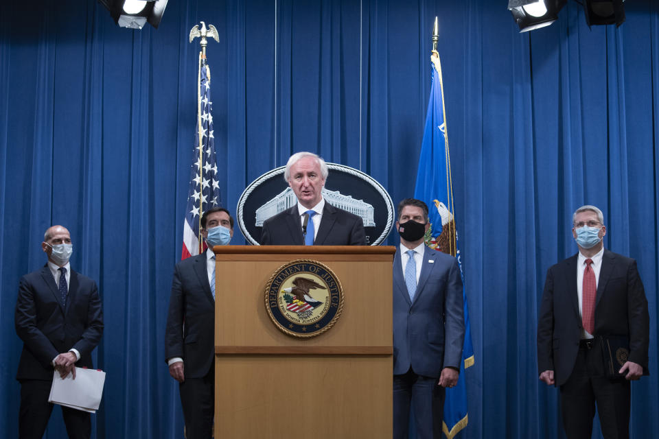 Deputy Attorney General Jeffery Rosen speaks, Wednesday, Sept. 16, 2020 at the Justice Department in Washington. The Justice Department has charged five Chinese citizens with hacks targeting more than 100 companies and institutions in the United States and abroad, including social media and video game companies as well as universities and telecommunications providers. Officials announced the prosecution on Wednesday. (Tasos Katopodis/Pool via AP)