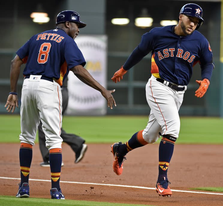 George Springer has rounded the bases quite a bit thus far. (AP Photo)