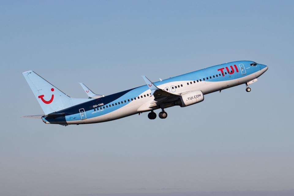 TUI Airlines Belgium Boeing 737-800 aircraft as seen departing from Eindhoven Airport