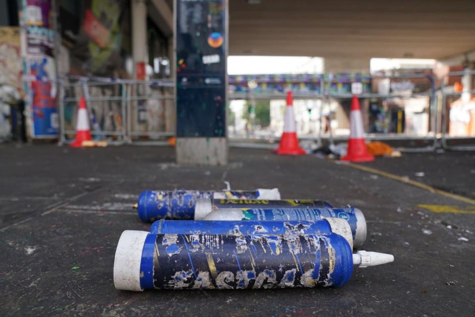 The worried mother found her son surrounded by canister the size of fire extinguishers (file photo) (PA Wire)