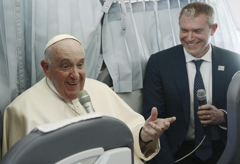 Pope Francis meets the journalists during a press conference aboard the airplane directed to Rome, at the end of his pastoral visit to Hungary, Sunday, April 30, 2023. (Vincenzo Pinto/Pool Photo Via AP)