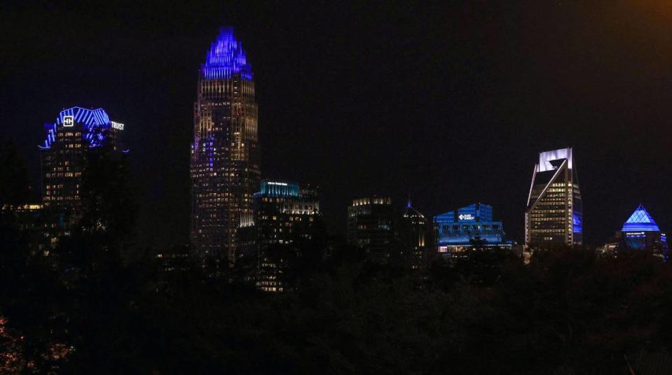 Uptown’s skyline shines blue in memory of the slain officers who lost their lives during a shootout in east Charlotte on Tuesday, April, 30, 2024.