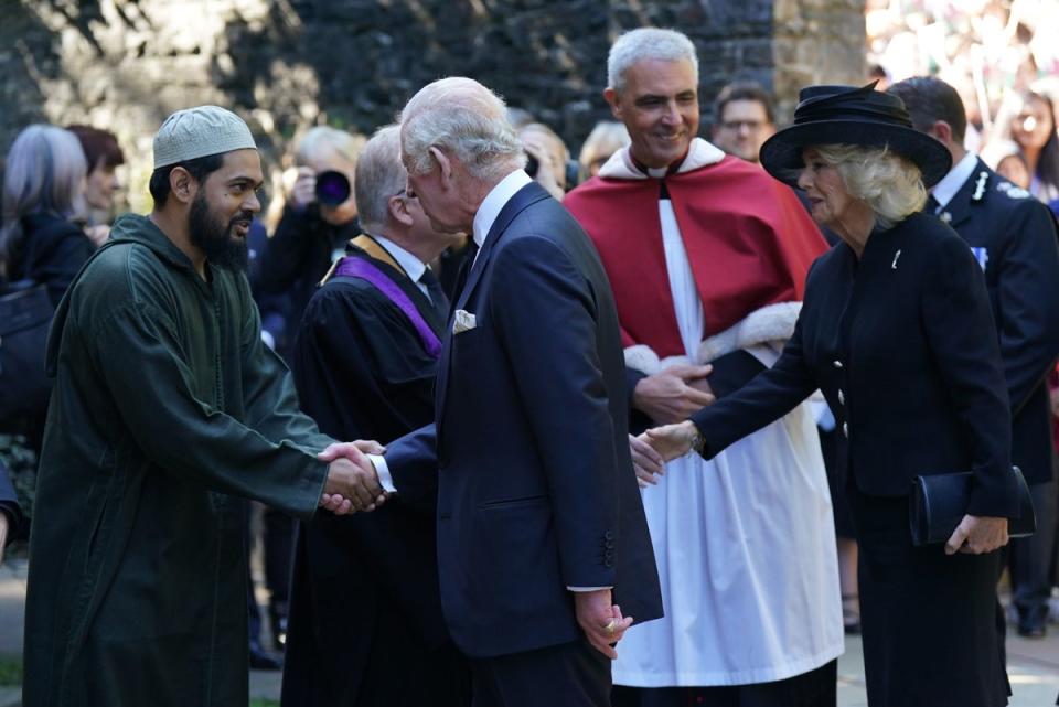 King Charles III and the Queen Consort arrive at Llandaff Cathedral in Cardiff, for a Service of Prayer and Reflection for the life of Queen Elizabeth II. (PA)