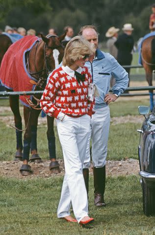 <p>Princess Diana Archive/Getty</p> Princess Diana in a Warm & Wonderful sheep sweater at Prince Charles' polo match in June 1983.