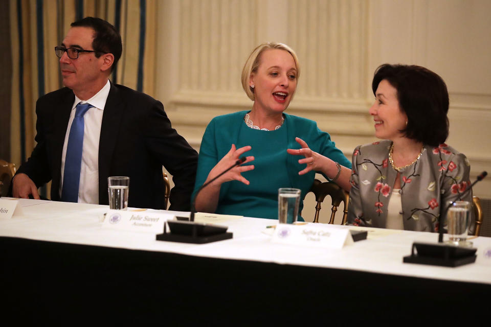 WASHINGTON, DC - JUNE 19:  (L-R) Treasury Secretary Steven Mnuchin, Accenture CEO Julie Sweet and Oracle Co-CEO Safra Catz visit before a meeting of the White House American Technology Council in the State Dining Room of the White House June 19, 2017 in Washington, DC. According to the White House, the council's goal is "to explore how to transform and modernize government information technology."  (Photo by Chip Somodevilla/Getty Images)